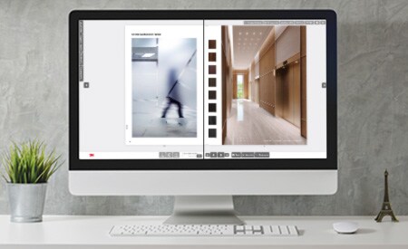 Monitor de ordenador con imagen del catálogo interactivo con acabados para superficies y para vidrios.
