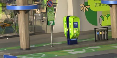 Cargador para VE superpuesto con señalización vertical.
