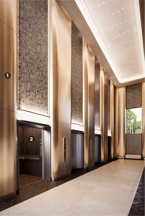 Pasillo de ascensor renovado con revestimientos decorativos metálicos 
