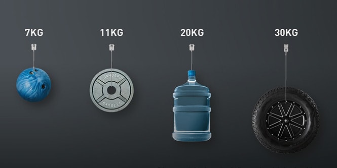 Cuatro objetos diferentes, cada uno etiquetado con sus respectivos pesos: 7 kg, 11 kg, 20 kg, 30 kg
