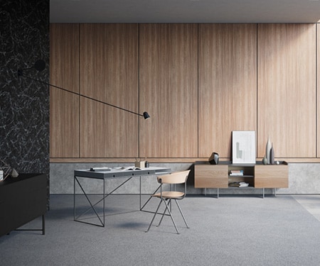 Interior de una habitación moderna y minimalista con paredes acabadas con revestimiento decorativo 3M DI-NOC de mármol negro, hormigón y madera de tono medio.
