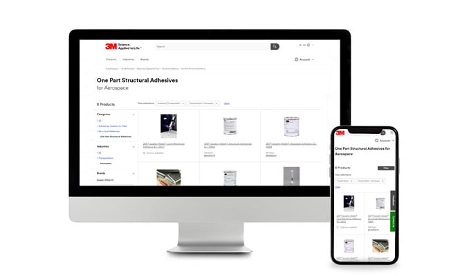 Ordenador y móvil que muestran productos aeroespaciales
